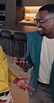 Happy, meeting and business people with discussion in kitchen for interior design or performance. Group, employees or designer laughing with smile, tablet or graph for planning or renovation budget