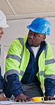 Architect, meeting and planning with people for construction safety, security or building design. Team, group or civil engineer with documents for brainstorming structure or architecture development