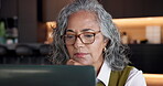 Remote work, research and woman with laptop in home, accountant or tax preparation with info on web. Freelance, senior bookkeeper and person with tech for budget, online and financial report in house