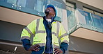 Happy, architect or black man with pride in city for building construction or maintenance. Low angle, male person or civil engineer with smile, vision or ambition for architecture development in town