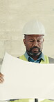 Construction, review or black man with blueprint, site report or progress track in renovation. Space, ppe or mature supervisor with paper, operation inspection or floor plan evaluation for remodeling