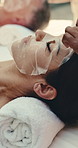 Facial, spa and woman with face mask at resort for skincare, beauty treatment and wellness. Hotel, salon and people with cosmetics for hydration, dermatology and cleanse for glow, detox and pamper