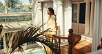 Resort, balcony and woman with smile, holiday and sightseeing on weekend, contemplating and tourism. Happy, tourist and mature person on break, positive attitude and thinking on vacation in hotel
