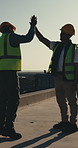 Construction worker, high five and men with smile, outdoor and agreement for renovation on rooftop. Builder, celebration and happy people with achievement, talk and collaboration on building site