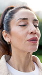 Woman, breathe and meditation outdoor for yoga, holistic balance and spiritual healing with chakra. Thinking, mature person or exhale in nature for inner peace, fresh air and technique of mindfulness