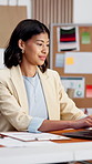 Woman, reading and laptop at startup for ecommerce, pricing and stock availability for shipping. Smile, person and tech in office with clipboard, supply chain and delivery invoice for online order