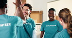 Smile, volunteer and team in charity with high five, goals and collaboration for community outreach. Happy, people and celebration in NGO for social responsibility, achievement or initiative success