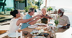 Friends, cheers and lunch on patio with champagne, summer holiday and celebration on weekend break. Happy, mature people and toast outdoor in backyard with alcohol drink, food and social connection.