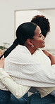 Therapy, hug and people in office with support group, empathy and compassion in mental health clinic. Security, psychologist or woman with sympathy, trust or peer understanding in counseling session.