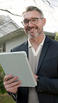 Face, realtor and smile at house with tablet, research and property viewing for real estate. Portrait, mature man or happy outdoor with digital, new listing and home inspection of residential auction
