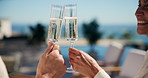 Cheers, hands and couple with champagne in resort for holiday, getaway or weekend together. Man, woman or relax with alcohol for toast and drink with vacation, honeymoon trip or bonding in retreat