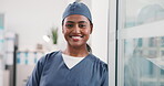 Medical, face and woman in hospital with smile, surgical assistant and pride in patient care. Wellness, portrait or happy nurse with confidence, preoperative specialist or about us in health industry