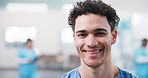 Face, man and nurse with smile in hospital for career pride, about us and medical service. Portrait, male person and job ambition for healthcare assistance, patient care and confidence for wellness