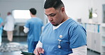 Nurse, man and tablet in clinic for healthcare report, diagnostic review and order blood test. Medical staff, person and typing on tech for pathology results, schedule follow up and care plan update