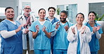 Happy, face and medical team with applause in hospital for winning, congratulations or achievement. Portrait, people or group of healthcare workers clapping with smile for procedure success in clinic