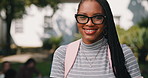 Student, backpack and face of woman at college for study opportunity, learning and education. University, portrait and happy person for development, knowledge and excited for scholarship on campus