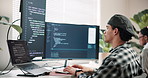 Man, screen and computer in office for coding, programming and update firewall for cybersecurity. Person, coworking and typing in workplace with tech, debugging system and testing for data protection