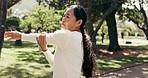 Woman, stretching and exercise outdoor with smile, mobility and wellness with warm up in park. Mature, Asian person and prepare for workout in nature, fitness and health with active lifestyle