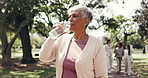 Break, water or happy woman in park with fitness, training pause or recovery with wellness activity. Hydration, smile or mature person with bottle, workout rest or refreshing stop in outdoor exercise