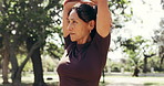 Woman, stretching and fitness in park with thinking, reflection and wellness with warm up outdoor. Mature, person and prepare for workout in nature, exercise mindset and health with active lifestyle