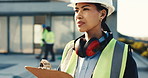 Engineer, writing and woman at construction site with clipboard, inspection and project management. Engineering, supervisor and person outdoor with checklist, review or notes for building operations.