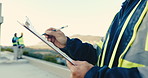 Hands, engineer and writing at site with clipboard, notes and inspection report for construction. Person, review or information on rooftop with checklist, blueprint and safety survey for architecture