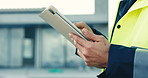 Hands, man and engineer at site with tablet, research and inspection report for construction. Male person, scroll and reading outdoor with digital, blueprint and compliance checklist for architecture