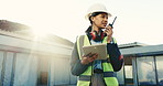 Engineer, radio and woman at construction site with tablet, project management and talk for guidance. Engineering, supervisor and person outdoor by building with tech, communication and instructions.