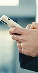 Hands, engineer and phone at site for construction, research and design approval for architecture. Person, inspector and typing outdoor with mobile, client inquiry and survey for building development