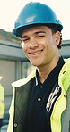Face, man and electrician with smile for construction, inspector and leadership for architecture. Portrait, technician and happy at site with helmet, project ppe and building supervisor of renovation