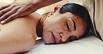 Spa, sleep, and woman on bed for back massage with physical therapy, relax or hospitality at resort. Hotel, luxury masseuse and mature person for stress relief, muscle reflexology or holistic detox