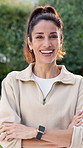 Fitness, face and woman with laugh outdoor for wellness, exercise and health for cardio routine. Happy, portrait and mature person with crossed arms for fresh air, active hobby and smile for break