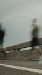 Speed, motion blur and people running in city with exercise, race practice or runner club training. Action, endurance and challenge with athlete performance, cardio and movement for sports outdoor