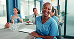 Happy woman, face and nurse in meeting for healthcare, integrity and confidence in hospital. Smile, specialist and medical team in boardroom for group management, opportunity and service minded