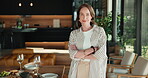 Celebration, face or woman in home with arms crossed, unwind or confidence with dinner preparation. Wellness, happy or mature person with party planning, peaceful moment or satisfaction on day off.