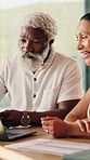 Man, couple and laptop in home for finance, check online banking and expenses on statement. Mature people, computer and discussion in house for budget, financial security and interracial relationship