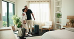 Vacation, couple and hug in hotel room with luggage, travel and impressed with luxury accommodation. Mature man, woman and resort arrival with suitcase, embrace and love with happy partner on holiday