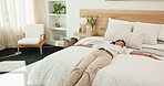 Spinning, smile and business woman in hotel room for happy, conference success and hospitality. Convention achievement, relax and seminar target with mature person on bed for excited and travel