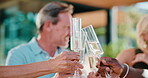 Hands, cheers and couple of friends with champagne for event, celebration and bonding with smile. Mature people, drinks and toast at house for reunion, birthday milestone and achievement recognition