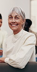 Therapy, smile and face of woman with group session, wellness career and mental health support. Portrait, mature person and counselor with patients, psychologist or about us in peer intervention