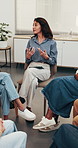 Support group, psychology and woman in counseling for discussion, coping strategy or experience. People, meeting and therapy circle for mental health, help and share guidance with tablet in office