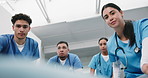 Stretcher, patient and nurses push with emergency for healthcare transport or transfer in hallway. People, medical team or moving gurney with face POV for clinic relocation, urgent care and low angle