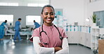 Medical, smile and woman in hospital with arms crossed, maternity nurse and career in labor ward. Happy, ambition and obstetrician with confidence, postnatal doctor or about us in healthcare industry