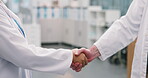 Medical, greeting and people in hospital with handshake, deal and cooperation in treatment plan. Intro, collaboration and doctor with shaking hands, agreement or opportunity in healthcare partnership