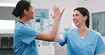 Nurse, team and happy in hospital with high five, support and encouragement on double shift. People, clinic partners and excited at center for solidarity, medical collaboration and healthcare service