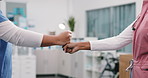 Team, fist bump and nurse with doctor in hospital, wellness and colleagues with medical achievement. Clinic, collaboration and people with healthcare services, solidarity and celebration for success