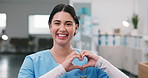 Face, happy and nurse with hand heart, kindness and nomination appreciation for medical support. Portrait, smile and woman at clinic with love gesture, thank you and gratitude for healthcare services