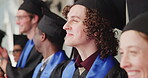 Smile, man and students at ceremony for graduation, farewell and celebration of degree completion. Happy, male person and graduate outdoor with regalia, valedictorian speech and education achievement