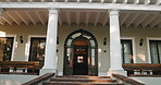 Education, stairs and entrance of university with architecture, building and opportunity in city. Infrastructure, campus and about us of college with front door, development and steps for growth
