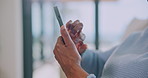 Hands, scroll and senior woman with phone for news, social media and online chat for connection. Home, typing and elderly African person on cellphone for website, search and networking on weekend